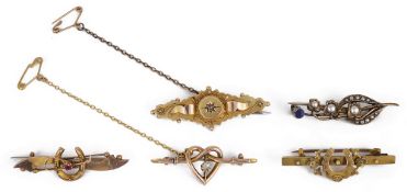 A collection of five Victorian brooches,