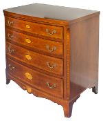 A mahogany and string inlaid bowfront chest of drawers, 20th century