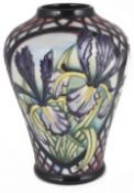A contemporary Moorcroft pottery 'Siberian Iris' vase by Sian Lepper, design date 2003