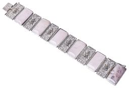 A Continental Art Deco filigree and rose quartz set panel bracelet