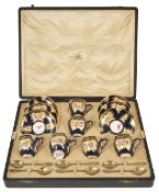 A Royal Worcester suite of six teacups with saucers and six silver teaspoons, circa 1923
