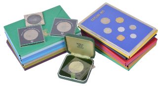 A collection of fourteen Royal Mint coinage sets