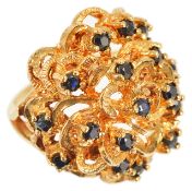 A contemporary 9ct gold and sapphire set bombe ring