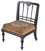 A Victorian ebonised doll's chair,