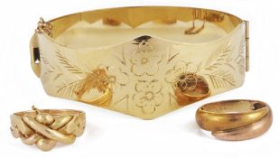 A four section gold puzzle ring,