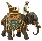A large contemporary cold painted bronze figure of elephant and rider after Bergman