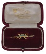 A Victorian 15ct gold and demantoid green garnet lizard bar brooch,