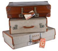 Three assorted vintage suitcases