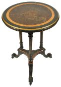 A Victorian ebonised circular side table