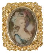 An unusual gold framed, gem set portrait pendant brooch