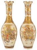 A pair of late 19th century Japanese Satsuma vases of slender neck baluster form,