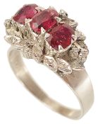 A Continental three stone ruby and diamond set cocktail cluster ring,