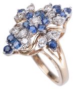 A contemporary sapphire and diamond shaped fancy cluster ring