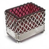 A Victorian pierced silver salt with pink glass liner, hallmarked Birmingham 1899