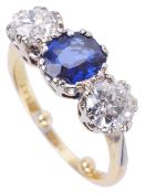 A three stone sapphire and diamond set ring