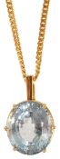 A large contemporary oval blue gem set pendant on chain