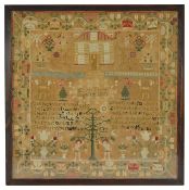 A framed Victorian sampler
