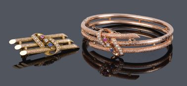 A Victorian style diamond, sapphire, ruby and pearl bangle and the matching broochboth pieces marked