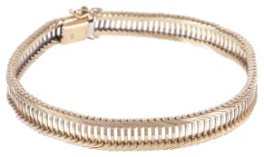 A 9ct gold articulated 'strap' bracelet, circa 1960the centre of pierced ladder link construction,