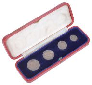A cased set of four Maundy Money coins dated 1933 in fitted case, (4)Condition: Fair to good with