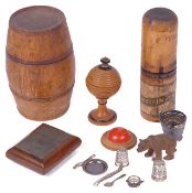 A small collection of miscellaneous treen and novelty silvercomprising a treen puzzle ball egg