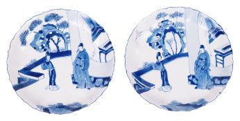 A pair of Chinese Kangxi blue and white porcelain dishescirca 1700each decorated with figures in a