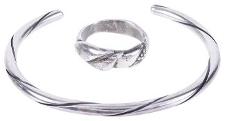 A Georg Jensen silver torque bangle and a similar Jensen ring, post 1945each piece fully marked,
