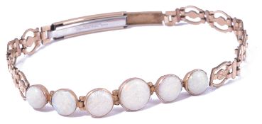 A six stone Edwardian opal set part bracelet the central section original and composed of six