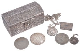 A 20th century white metal casket possibly Persianof sarcophagus shape decorated with flowers,