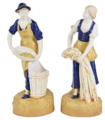 A pair of Royal Dux figurines of a young boy and girl gathering fruit and wheat