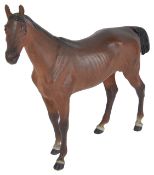 A cold painted bronze figure of a horse, in the style of Bergman