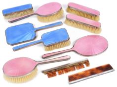 A suite of Mappin & Webb enamelled dressing table brushes and mirrorsa clothes and hair brush with