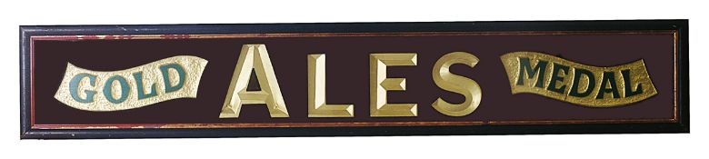 A contemporary pub sign ' Gold Medal Ales'