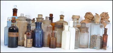 A collection of early 20th century apothecary bott
