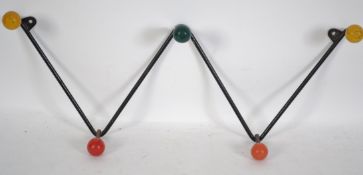 A vintage retro atomic sputnik style set of coat h