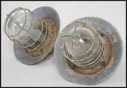 A pair of 20th century industrial caged bulkhead l