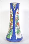 A 1930's Wilton Ware vase by AG Harley Jones having fabulous lustre finish with blue ground and