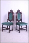 A pair of 19th century VIctorian oak Carolean revival barley twist dining chairs. The barley twist