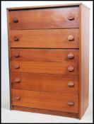 A 1970's retro upright teak wood Danish inspired pedestal chest of drawers having a series of