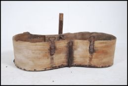 An unusual 19th century agricultural mule trug - horse's side carrier. The kidney shaped trug with