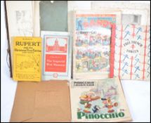 A collection of ephemera to include a 1940's Dandy comic, an early pinocchio album, Free French