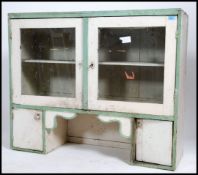 An early 20th century shabby chic painted two tone