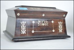 A Victorian rosewood and mother of pearl inlaid sarcophagus shaped workbox with plinth base,