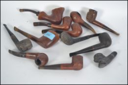 A collection of 20th century vintage smoking pipes