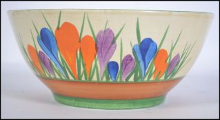 An early 20th century Clarice Cliff ' Bizarre ' fruit bowl being marked to the base, the design with
