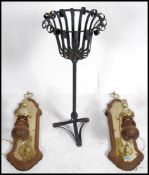 A pair of stunning 20th century oak and brass wall light sconces. The brass light fixtures being