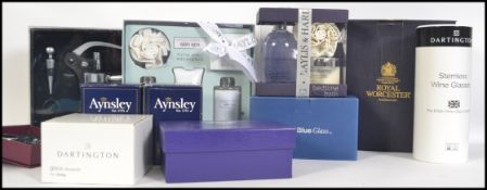 A collection of boxed items to include ceramics by Royal Worcester, Aynsley, Dartington wine