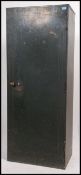 A vintage Industrial metal locker cabinet having g