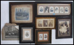 A collection of framed and glazed family photographs portraits dating from the late 19th century