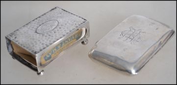 An early 20th century silver hallmarked cheroot / cigarette holder case having o monogram to the